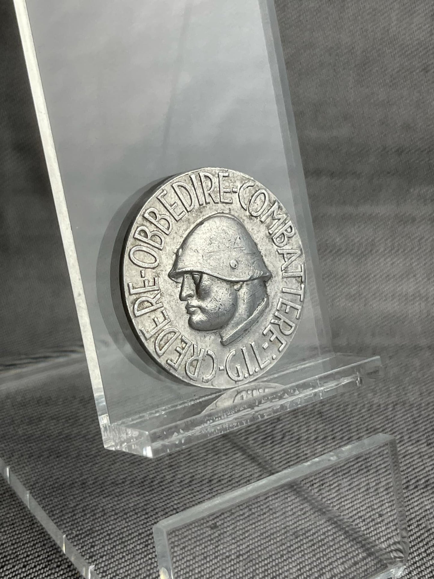 ITALIAN WW2 FASCIST YOUTH G.I.L. "BELIEVE, OBEY AND FIGHT!" ALUMINUM TINNIE BADGE MAKER MARKED